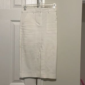 White size 0 pencil skirt from Bebe rarely used great condition.